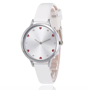 Detail of white leather watch strap with heart-shaped crystal markers on the dial