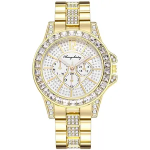 Women's gold quartz watch with crystal-encrusted bezel and metallic steel strap