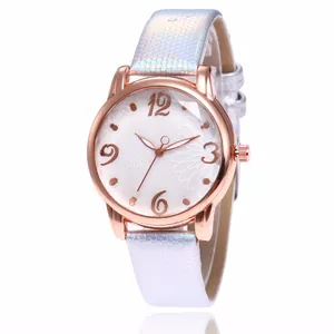 Detailed macro view of the floral patterned dial and rose gold case of this watch