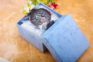 Men's sport watch with red accents in a textured light blue gift box with white lining