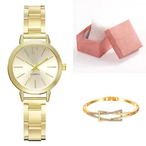 Elegant gold quartz watch set with slim metallic band and crystal bracelet in gift box