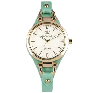 Montre à quartz minimaliste pour femme avec bracelet menthe et boîtier doré