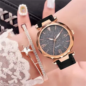 Women's rose gold quartz watch with starry black dial and star charm bracelet set