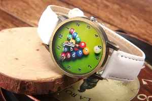 Detailed view of bronze quartz watch with green billiard pattern dial and white leather strap