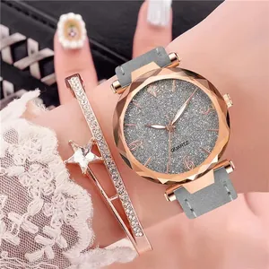 Detail of rose gold quartz watch with star bracelet set on woman wrist