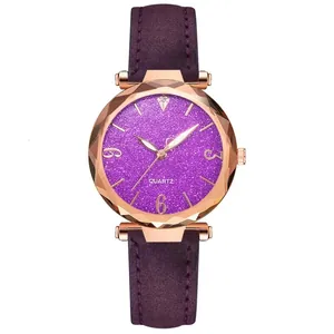 Detailed macro view of multifaceted prism glass and purple glitter dial on rose gold watch