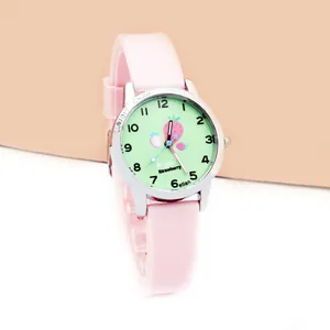 Close-up of kids strawberry quartz watch with pink silicone strap and silver metal case