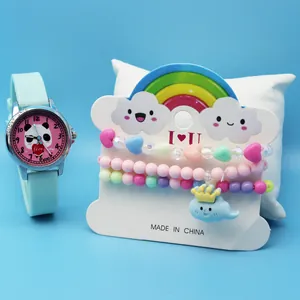 Blue panda quartz watch and macaron beaded bracelets set for kids on blue background