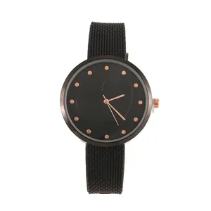 Chic black women's watch featuring a subtle heart dial pattern and rose gold accents
