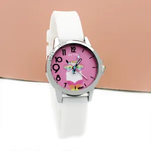Close-up of kids quartz watch with white silicone strap and alpaca cartoon dial detail