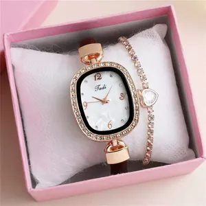 Rose gold quartz watch and heart rhinestone bracelet set in a pink gift box