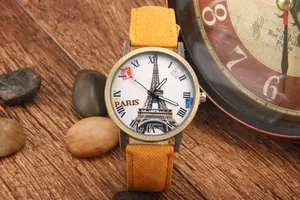 Orologio al quarzo retrò con quadrante Torre Eiffel e cinturino in tessuto giallo