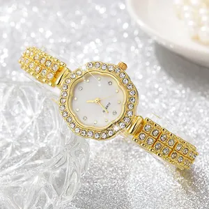 Detail of luxury women's quartz watch featuring floral rhinestone bezel and diamond strap
