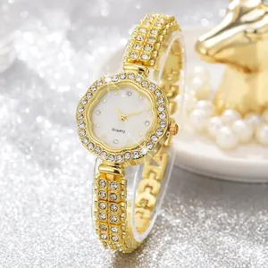 Luxury gold flower quartz watch for women with sparkling diamonds and elegant petal design