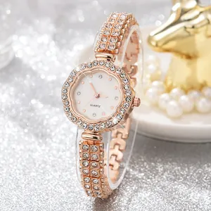 Luxury rose gold women's quartz watch set with rhinestones and floral dial