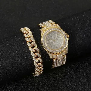 Luxury gold iced-out watch and Cuban bracelet set with shimmering white crystals