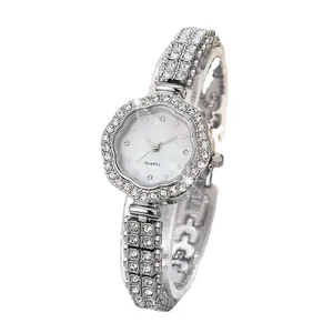 Luxury silver women quartz watch with petal shaped diamond bezel and rhinestone strap