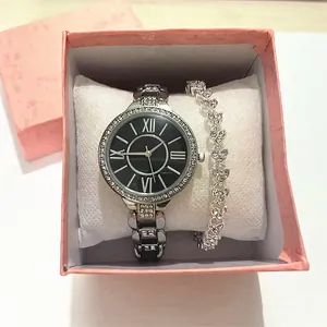 Orologio di lusso con quadrante nero, numeri romani e lunetta di diamanti in scatola