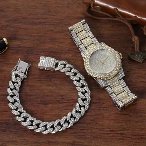 Detail of luxury iced-out watch and Cuban link bracelet set on a premium dark wooden desk