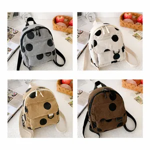 Polka dot corduroy mini backpacks in gray, off-white, khaki and brown colors