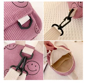 Detailed views of corduroy backpack fabric texture, plastic buckle, and white strap