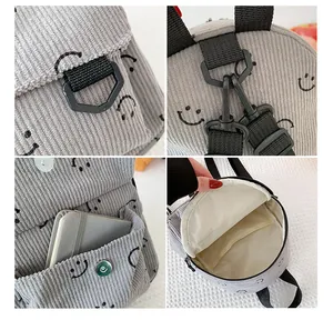 Detailed views of light gray corduroy backpack with smiley prints and inner compartments