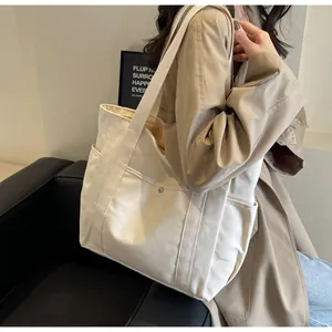 Large capacity off-white canvas tote bag for daily commute, work, and students