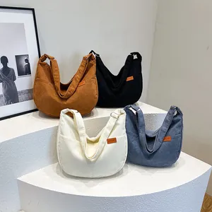 Corduroy hobo shoulder bag for women in brown, black, white, and blue colors