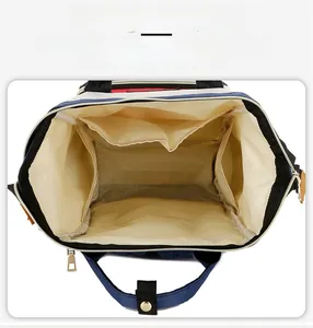 Top view detail showing spacious interior compartments of the waterproof diaper backpack