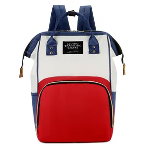 Multicolor large capacity diaper backpack in red, white and blue with top handles