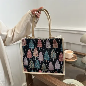 Linen tote bag with colorful Christmas tree prints and durable jute top handles