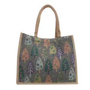 Linen tote bag with colorful Christmas tree patterns and rustic braided rope handles