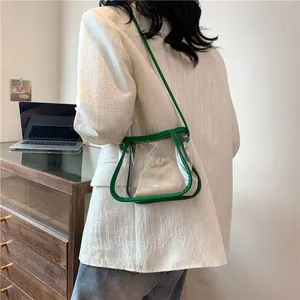 Borsa a tracolla in PVC trasparente con bordo verde e sacchetto interno con coulisse