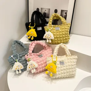 Bubble textured mini handbags in five pastel colors with cute plush pendants for women