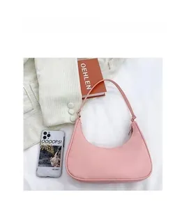 Detailed top view of the pink hobo shoulder bag with a smooth zipper and nylon fabric