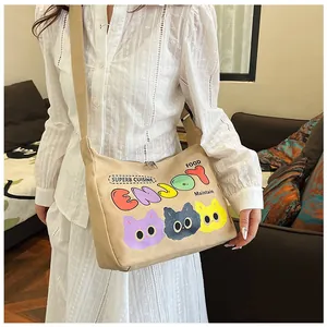 Dettagli della borsa in tela beige con tre gatti carini e stampa con scritta ENJOY