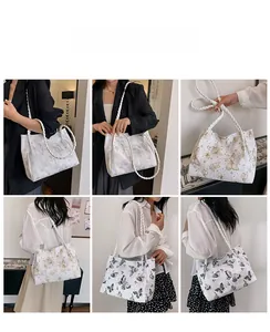 Multiple views of butterfly print canvas tote bag shown with woven handles on model