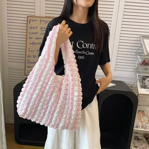 Pink and white striped pleated hobo bag in minimalist French style for women