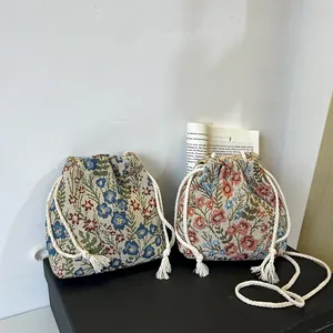 Women's Retro Floral Jacquard Drawstring Bucket Bag Canvas Crossbody Shoulder Bag Mini Phone Pouch With Tassels