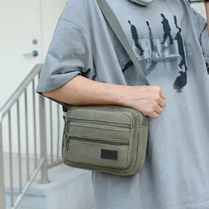 Men's army green canvas messenger bag with multi-pocket functional sport design