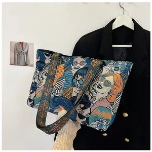 Detail der Jacquard-Leinentasche mit lebhaftem Pop-Art-Porträt und breitem Schultergurt