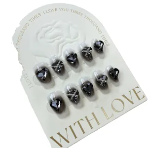 Handmade gradient grey press-on nails with black heart crystal and silver chain links