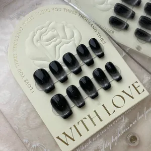 Handmade brown cat-eye gradient coffin press-on nails set with 10 pieces on display