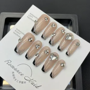 Handmade gradient black French press-on nails with sparkling rhinestones and heart gems