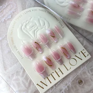 Pink gradient press-on nails with white floral art and silver glitter long ballerina shape