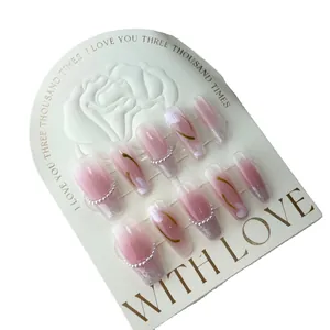 Handmade pink blush gradient press-on nails with tulip flowers and pearl accents