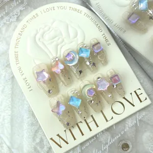 Handmade press-on nails with 3D aurora butterflies and crystals on a lace background