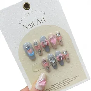 Handmade mocha blue and pink coffin press-on nails with 3D hearts, bows, and crystals