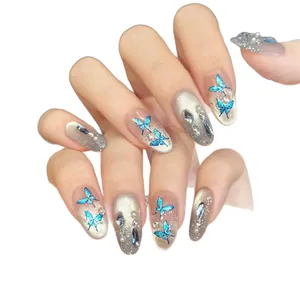 Blue butterfly gradient press-on nails with silver glitter, pearls and rhinestones decoration
