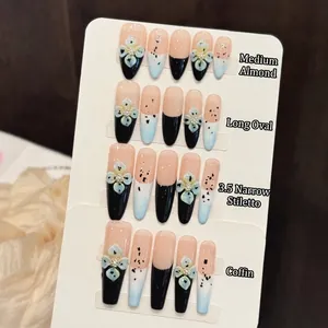 Handmade press-on nails set with 3D floral accents in almond and coffin shapes